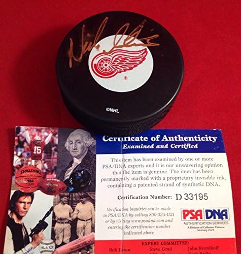 Nicklas Lidstom imzalı Detroit Red Wings Hokey Diski PSA / DNA Sertifikası D33195-İmzalı NHL Diskleri
